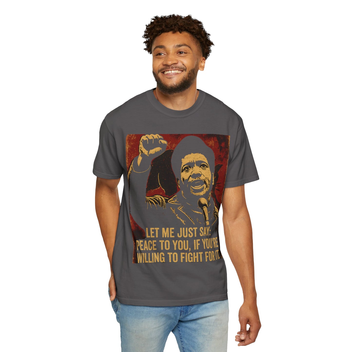 Model wearing Fred Hampton Tee in charcoal gray, a unisex T-shirt blending comfort and activism, great for casual and motivational apparel looks.