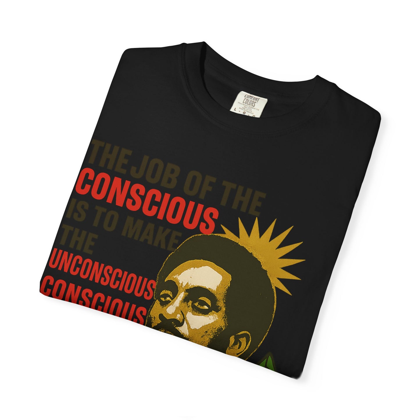 Folded black Kwame Ture Tee with colorful activist artwork and quote, made from soft garment-dyed cotton for comfort.